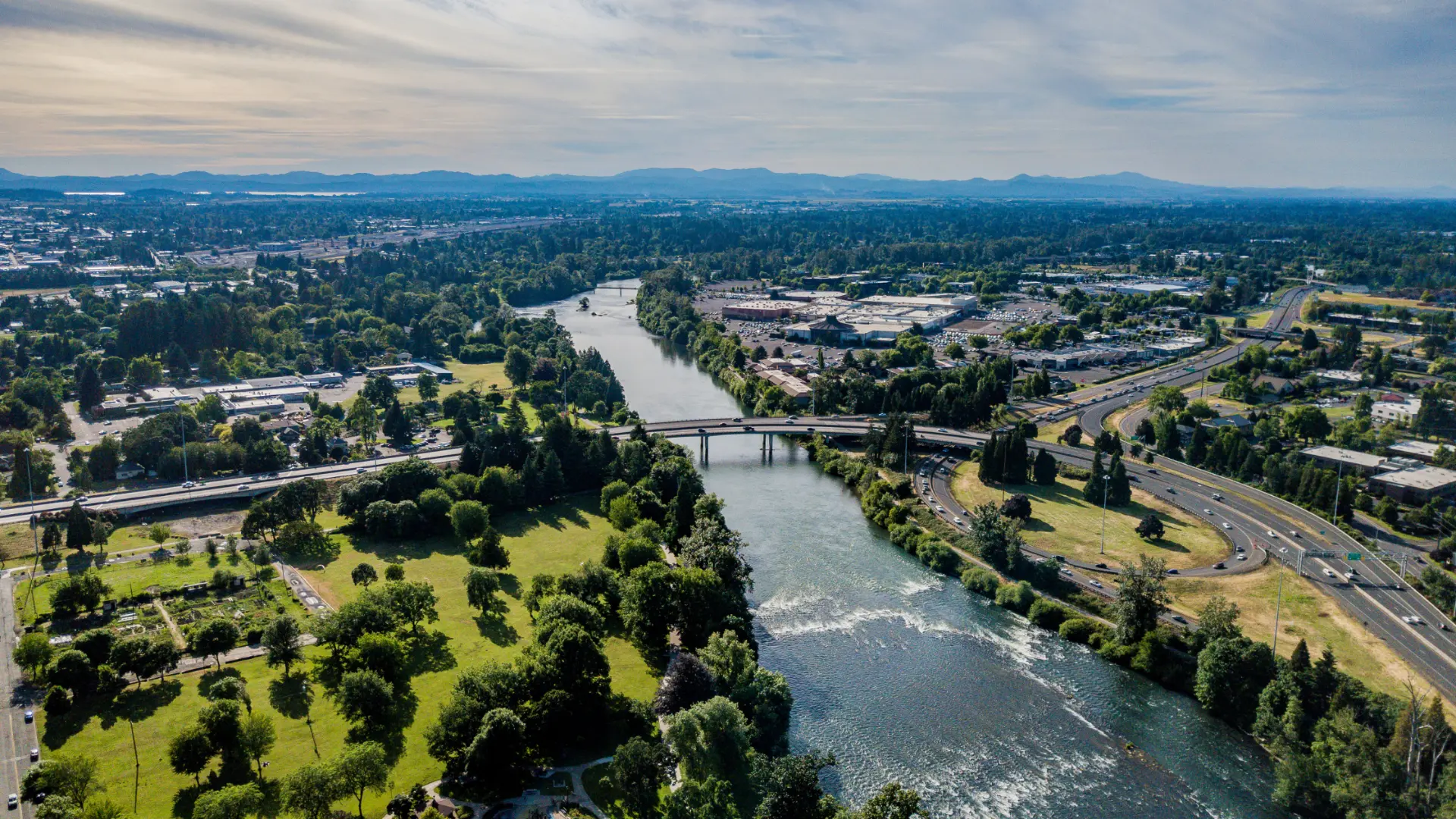 Aerial view of the Willamette River and bridges running through Eugene, Oregon