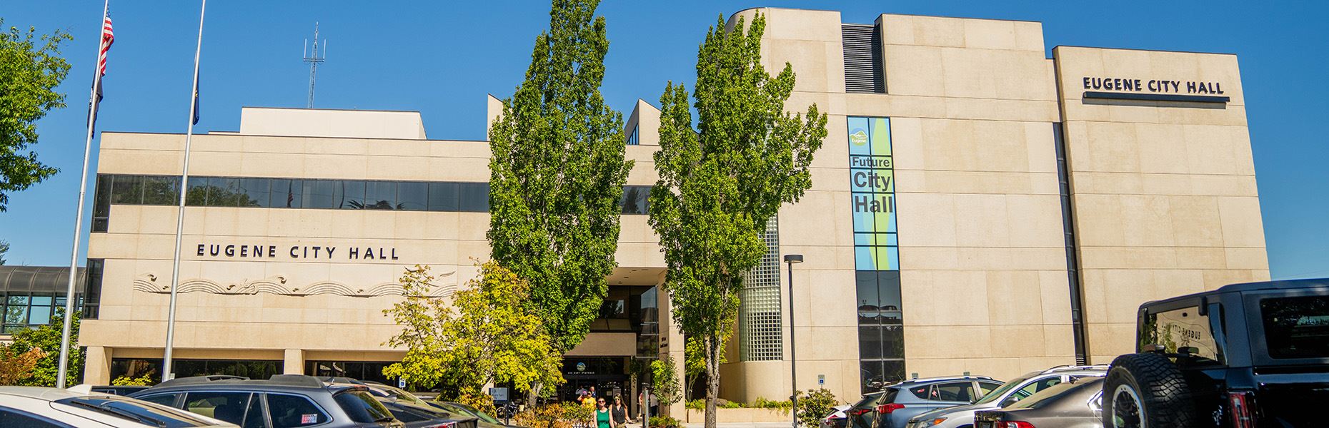 The former EWEB headquarters building displaying a Future City Hall banner, Eugene, Oregon